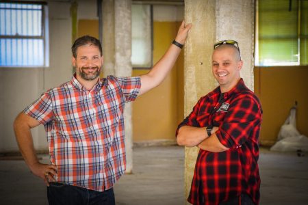 Ficklewood Cider owners Joe Farrier (left) and Stefan Enjem (right) stand in the future space of their cidery. Photo by Brian Addison.
