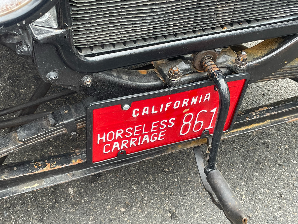 A 1919 Model T Touring had a display plate that read "horseless carriage."
