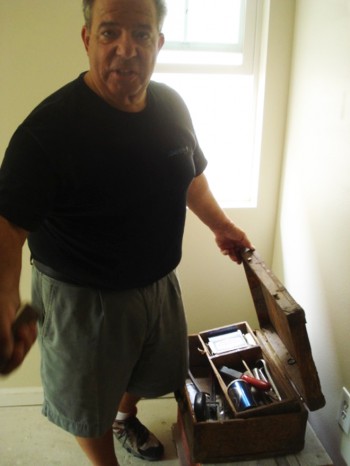 Mayor Foster proudly displays his tools.