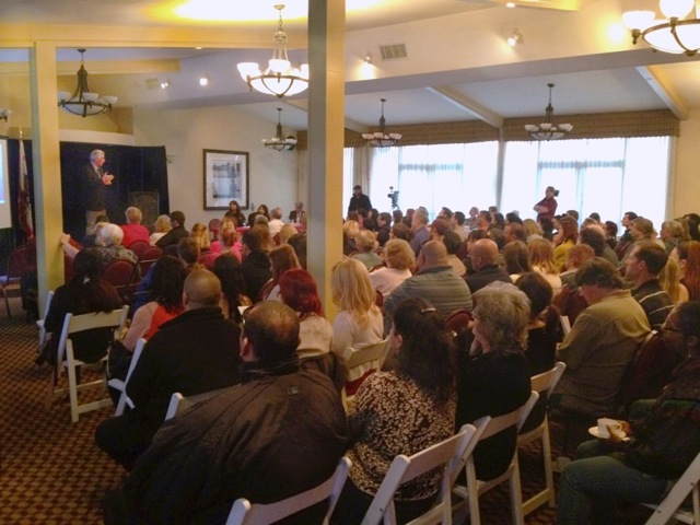 Eric Sakach, senior law enforcement specialist in animal cruelty for the Humane Society of the United States, speaks to a packed room at the Animal Cruelty Conference presented by the Long Beach City Prosecutor’s Office.