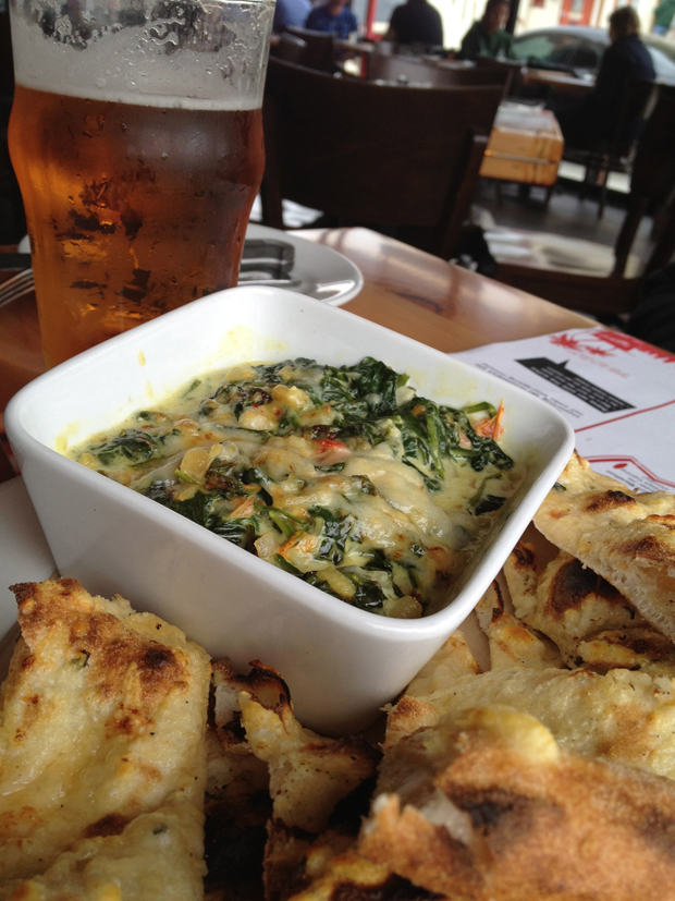 Indian-Spiced Spinach Dip, served with flat bread. A fresh take on an old favorite! Indian-Spiced Spinach Dip