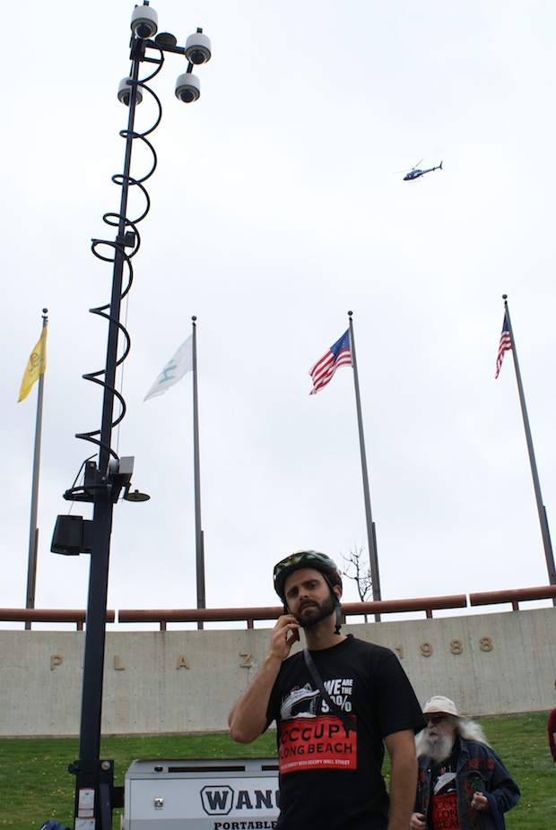OLBer Ben Fisher calling the City to inquire about the surveillence unit that was waiting for OLBers at City Hall OLBer Ben Fisher calling the City to inquire about the surveillence unit that was waiting for OLBers at City Hall