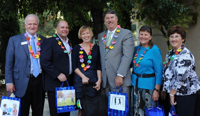 Long Beach Day Nursery’s new board officers were installed at LBDN’s East Branch and received special congratulatory macaroni necklaces made by the children. Left to right are: Recording Secretary Michael Soutar (President/Partner, MSP Architects), Treasurer Steven T. Romeyn (Controller & IT Administrator, Commerce Casino), Board Chair Deloris Mayuga (Real Estate Investor & Property Manager), Chair-elect Jon Gotz (President, Gotz Insurance Agency), 1st Vice Chair Governance Julie Taboada (Retired Educator), and 2nd Vice Chair Resource Development Joan Alderson (Retired Controller, Girl Scouts of Orange County).