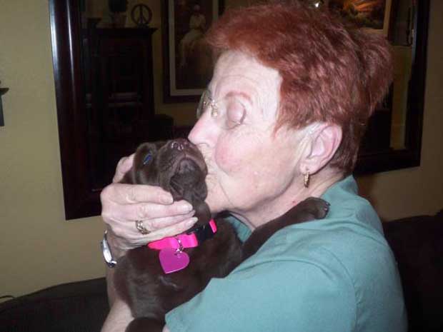 Miriam kissing dog