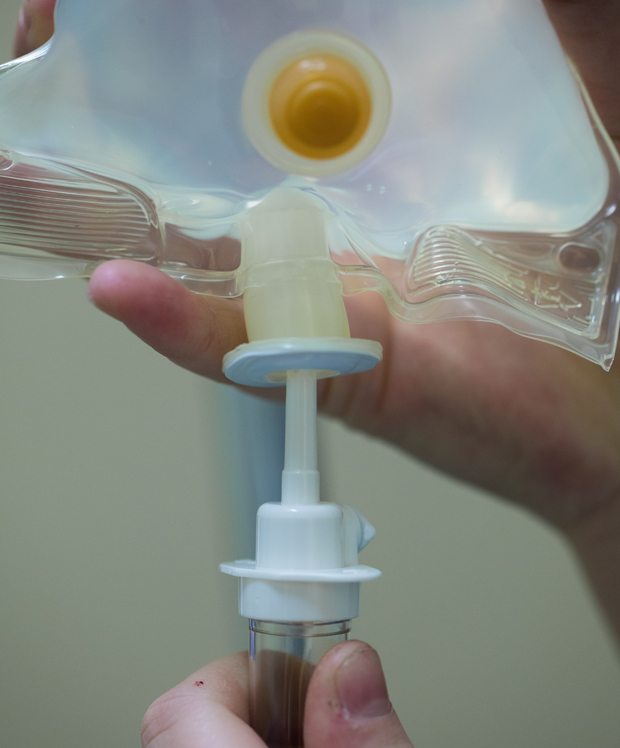 Inserting IV set