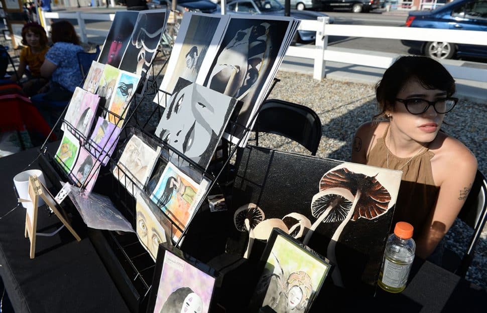 Artist Kim McIntoch at her booth during Summer LuvinÕ Fest, at 5301 Long Beach Boulevard in North Long Beach Saturday. The free family friendly event featured multiple bands, as well as vendors, artists and the Long Beach local El Exclusivo food truck on site in Long Beach Saturday, September 1, 2018.<br /> Photo by Stephen Carr / For The Long Beach Post