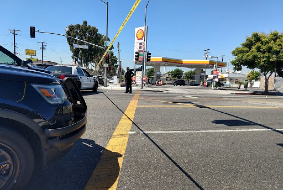 Police taped off a gas station at Long Beach and Artesia boulevards as one of multiple crime scenes after a shooting. Photo by Valerie Osier.