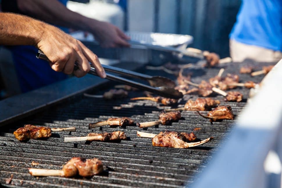 George's Greek Cafe employees cook lamb chops to perfection at the Greek Fest in Long Beach Sunday September 2, 2018. Photo by Kelly Smiley for the Long Beach Post Photo by Kelly Smiley