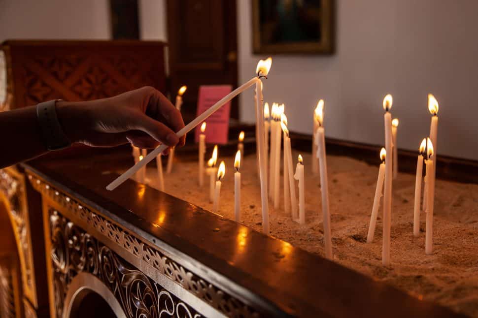 The tradition of lighting candles at the entrance to the Greek Orthodox Church is followed at the Greek Fest in Long Beach Sunday, September 2, 2018. Photo by Kelly