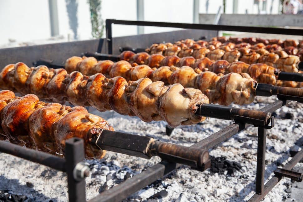The Greek Fest signature dish, Rotisserie Chicken, roasts over hot coals in Long Beach Sunday, September 2, 2018. Photo by Kelly Smiley for the Long Beach Post Photo by Kelly Smiley