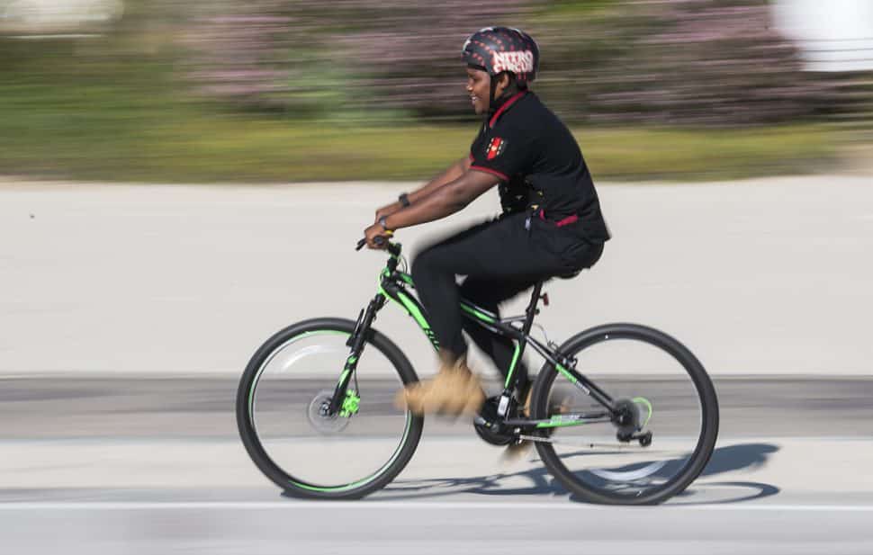 Jassiah Smith,14 of Long Beach, rides his new bike after the Long Beach police took a collecting to replace his bike after it was stolen over the weekend in Long Beach October 23, 2018. Photo by Thomas R Cordova.
