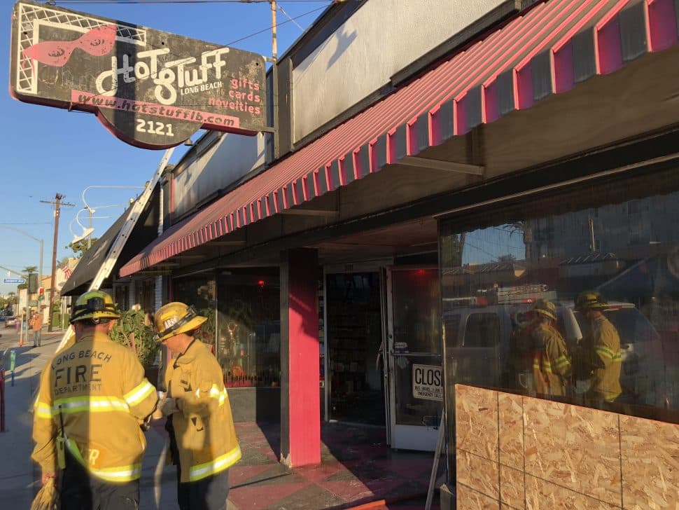 Firefighters were still outside Hot Stuff hours after the fire was doused Friday morning. Photo by Jeremiah Dobruck.