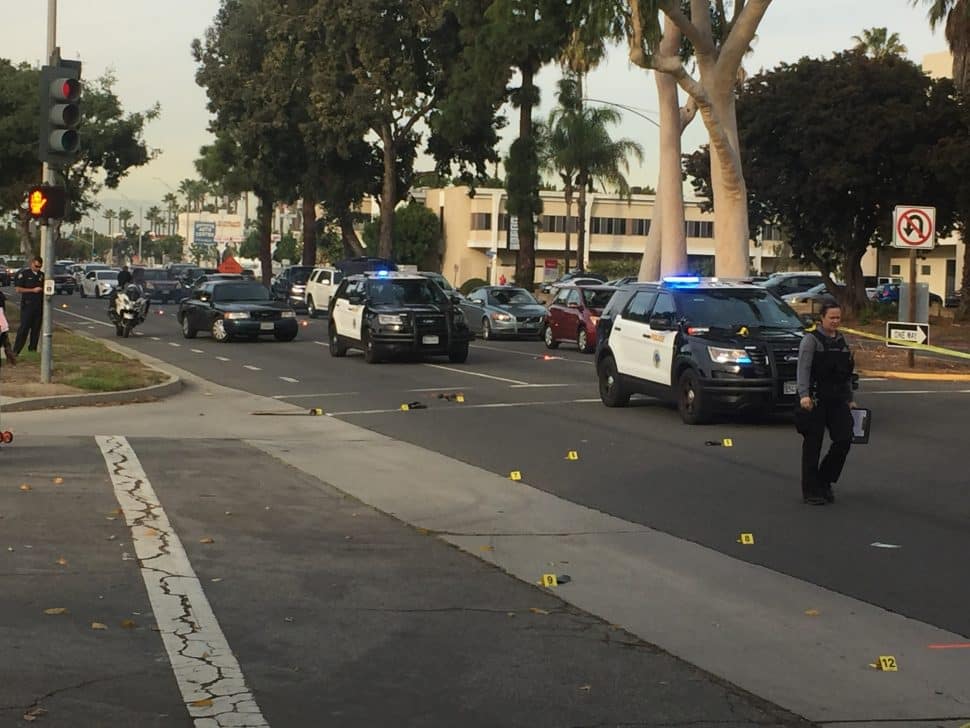 Police investigate at the scene of a collision at Bellflower Boulevard and 27th Street on Nov. 27, 2018. Photo by Stephen Carr.